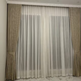 Beige blackout and sheer curtains