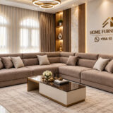 Modern beige corner sofa in a bright Riyadh living room with large windows